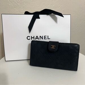 CHANEL Black Quilted Wallet with Gold Logo